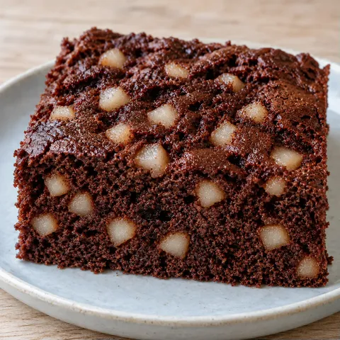 Torta al cacao — pere, cardamomo
