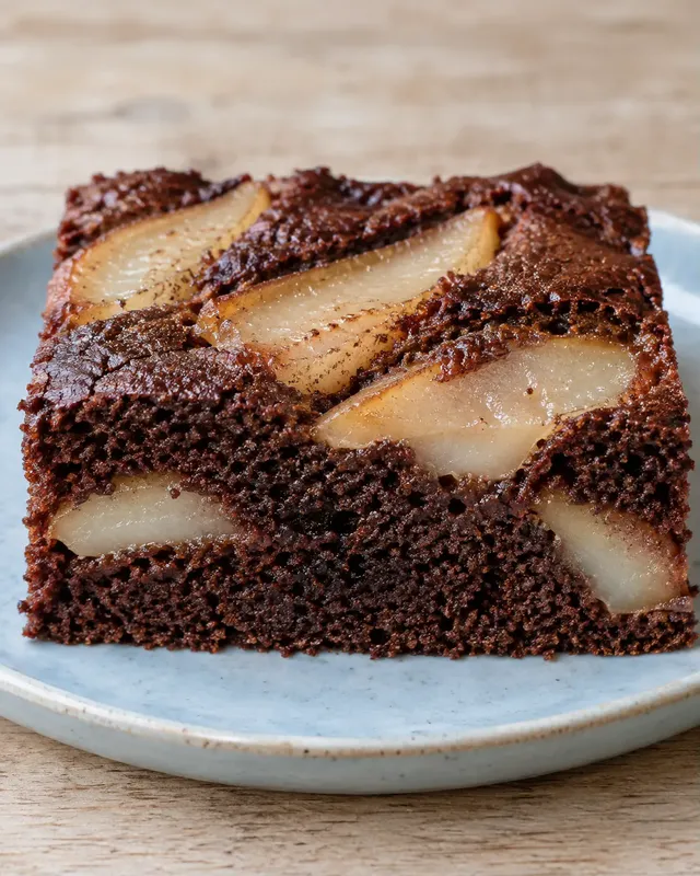 Torta al cacao — pere, cardamomo